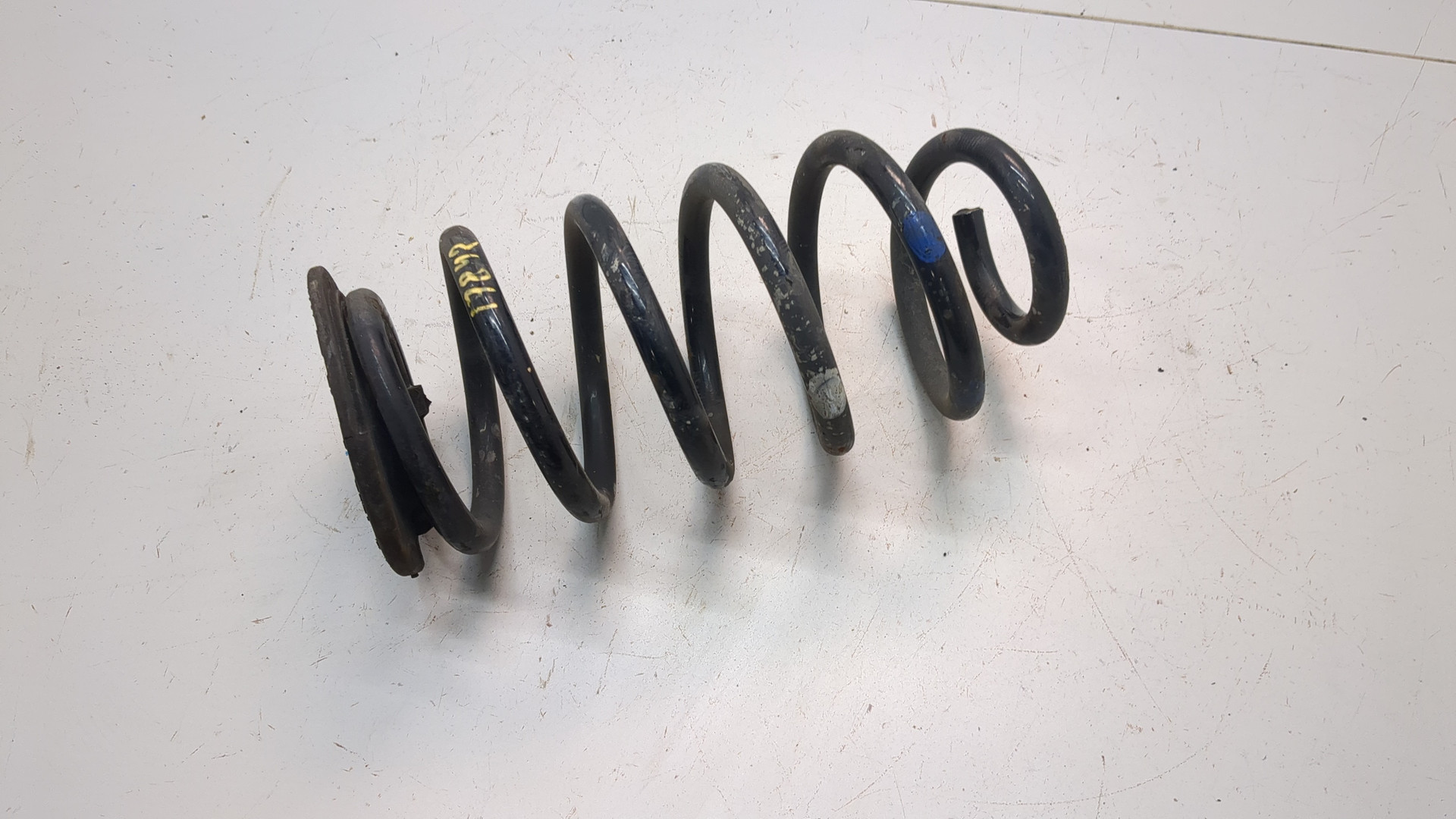 Пружина задняя