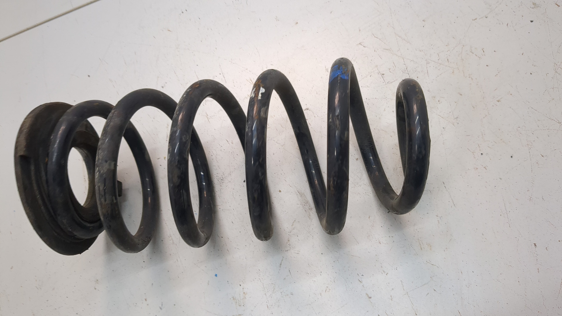 Пружина задняя