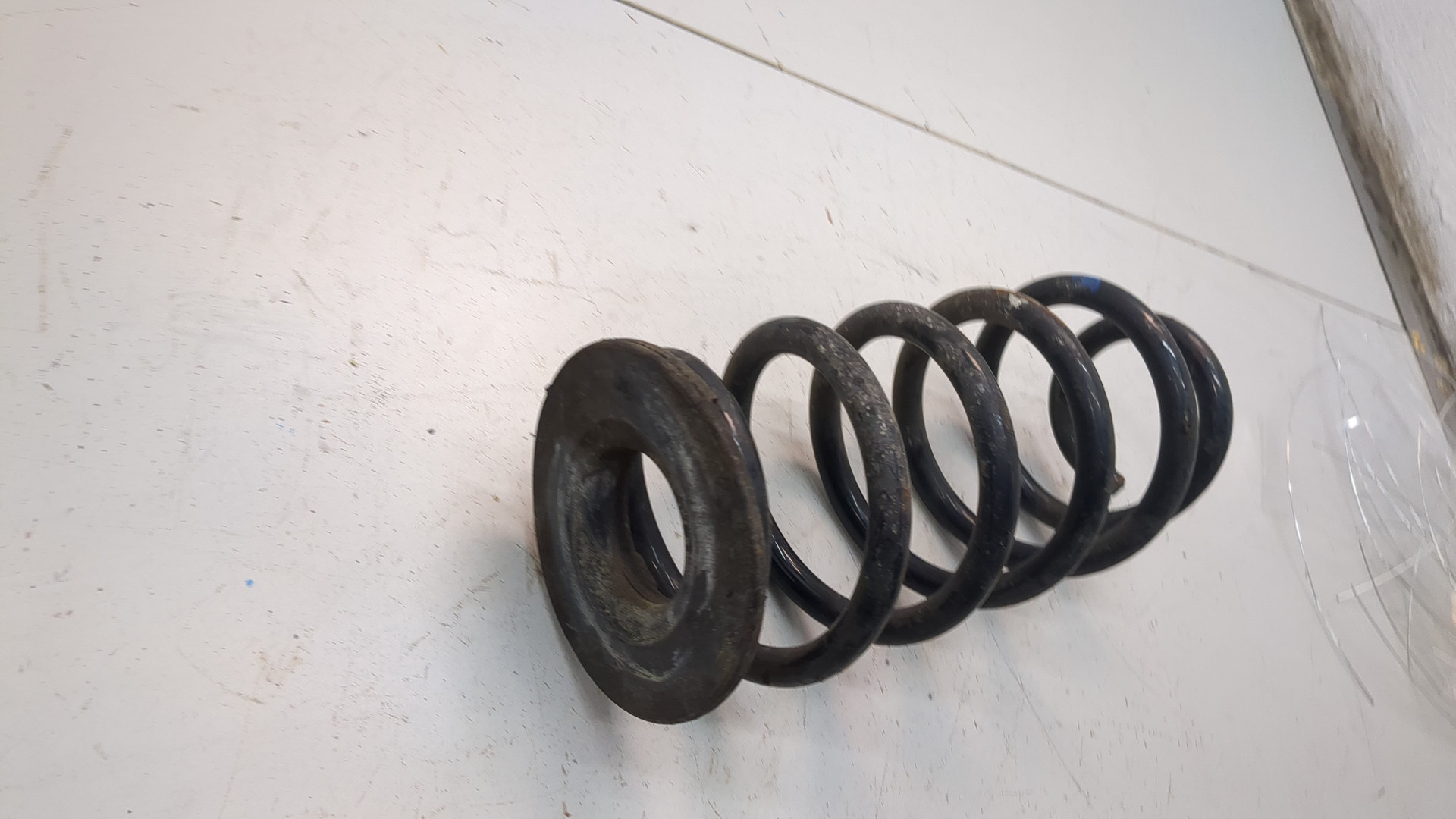 Пружина задняя