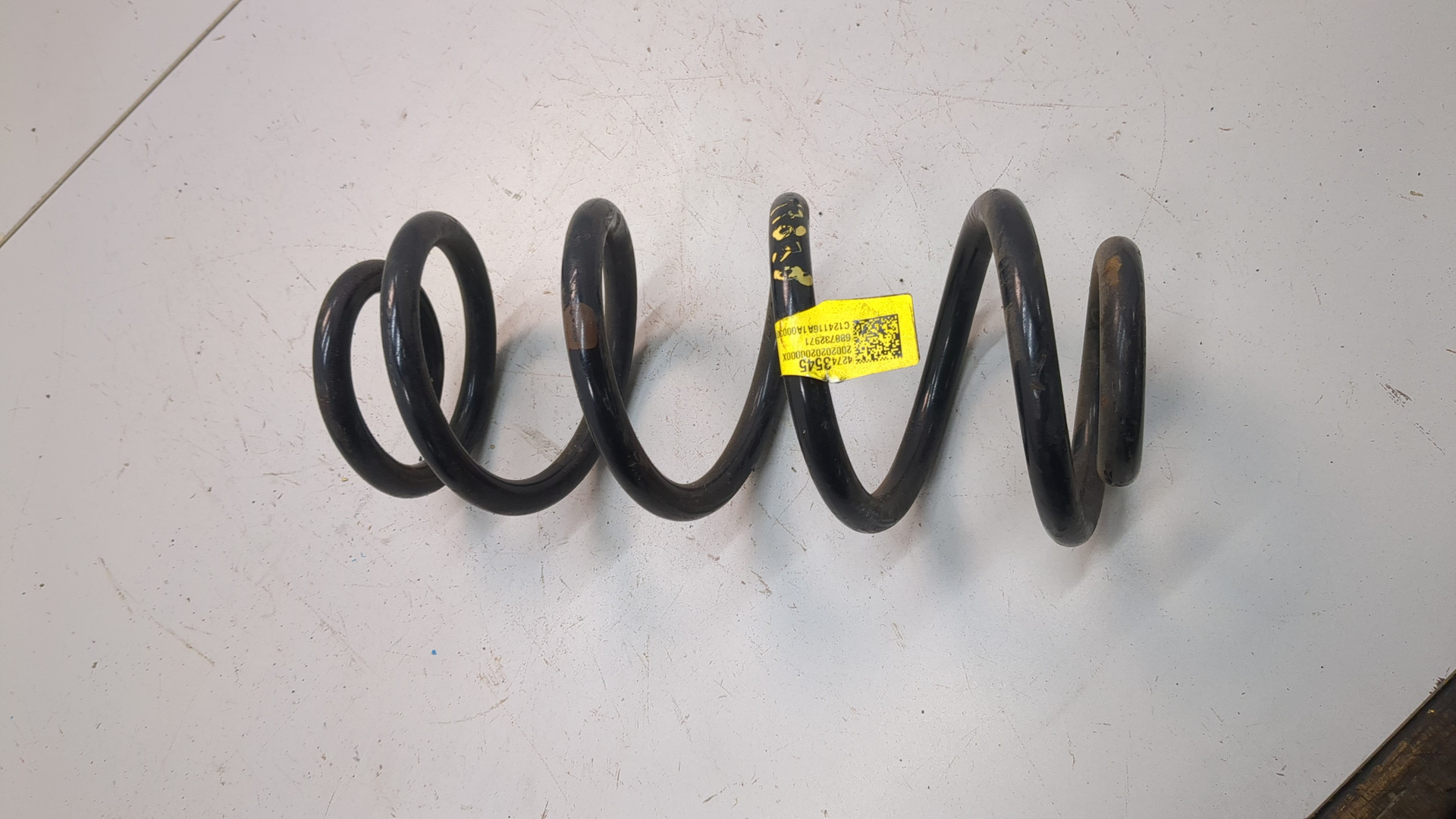 Пружина задняя