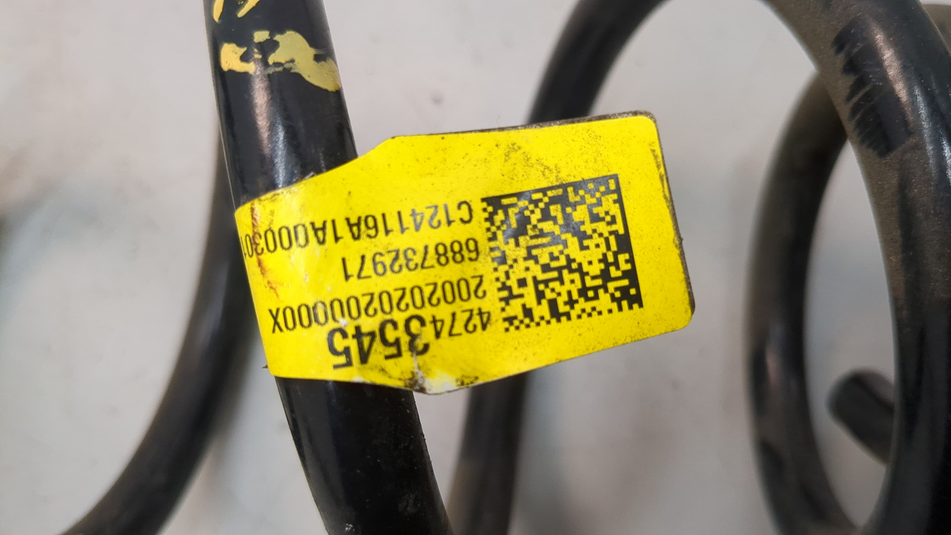 Пружина задняя