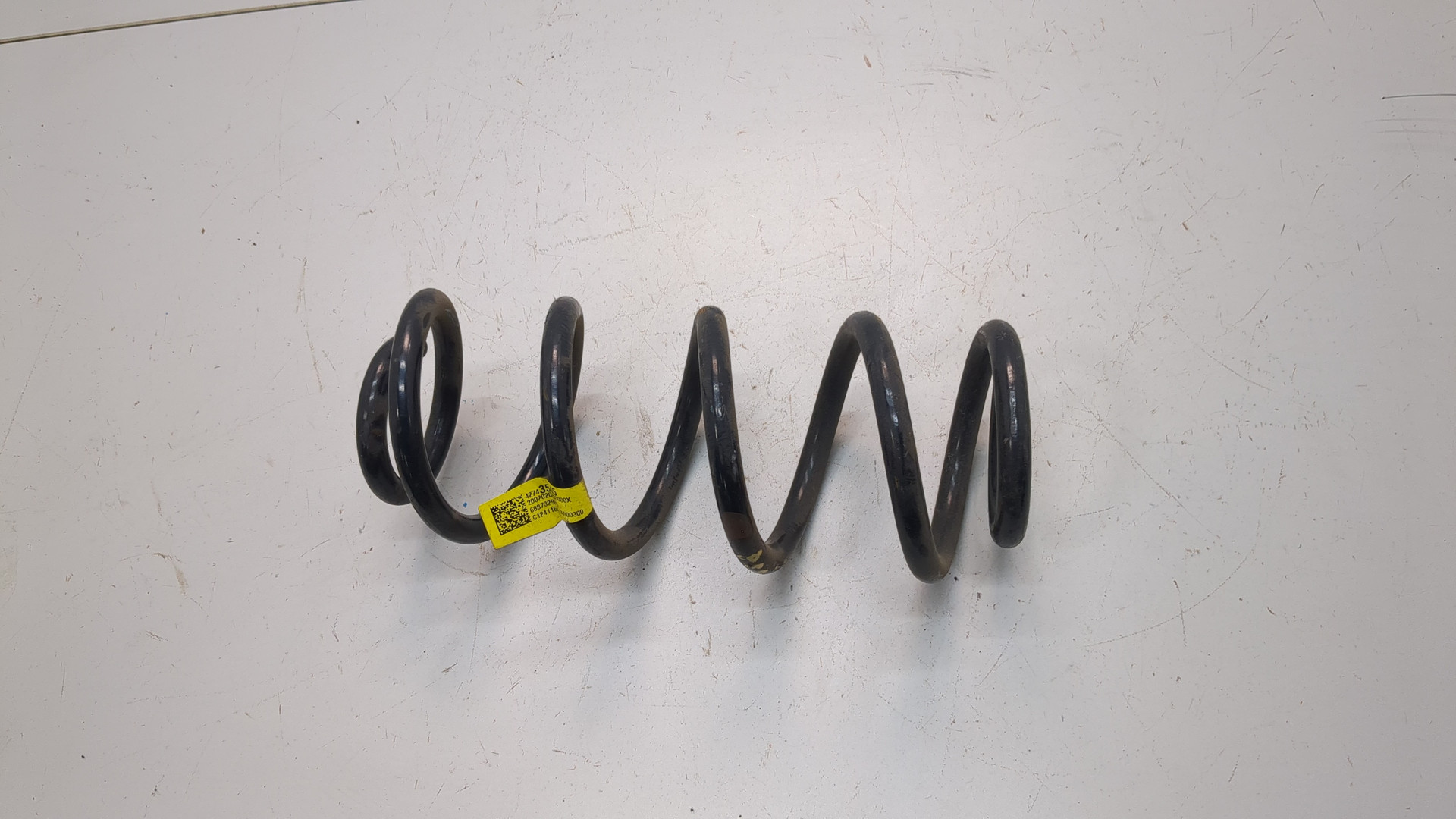 Пружина задняя