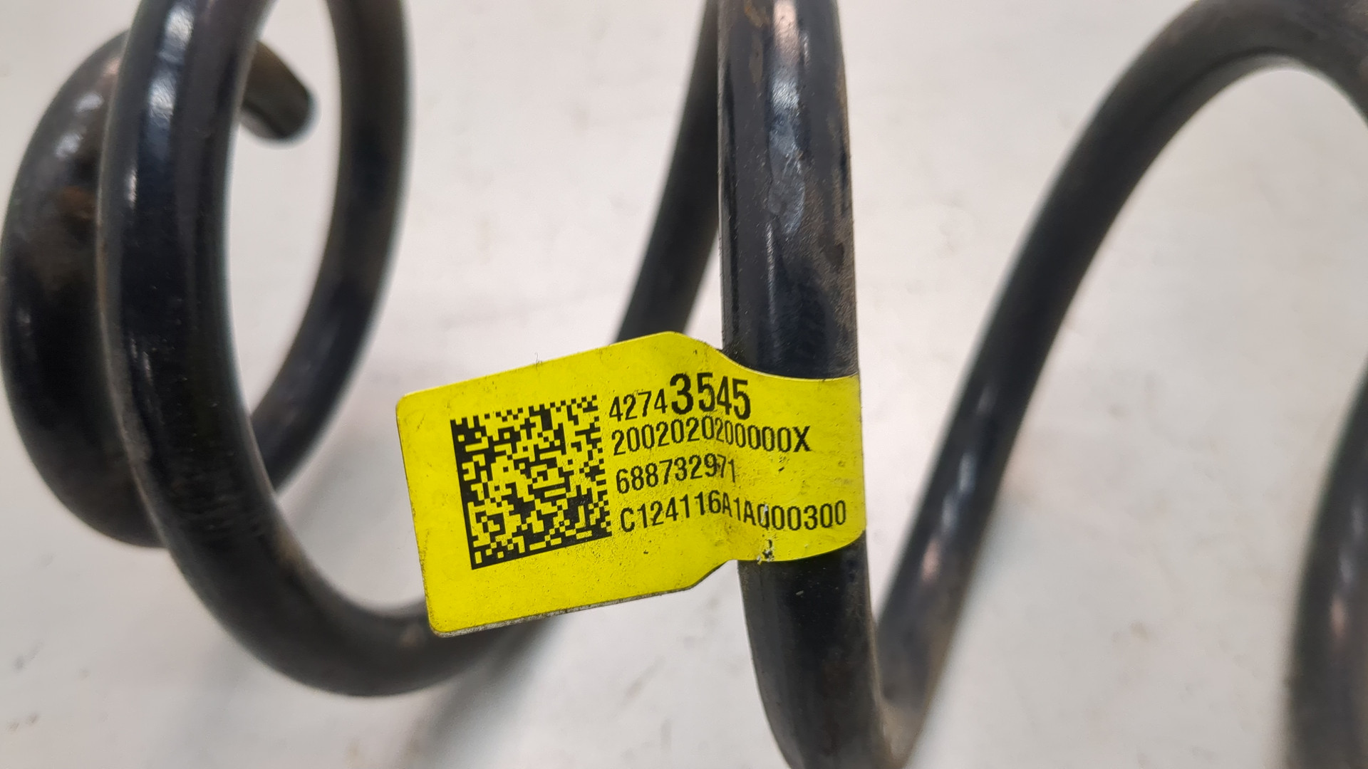 Пружина задняя