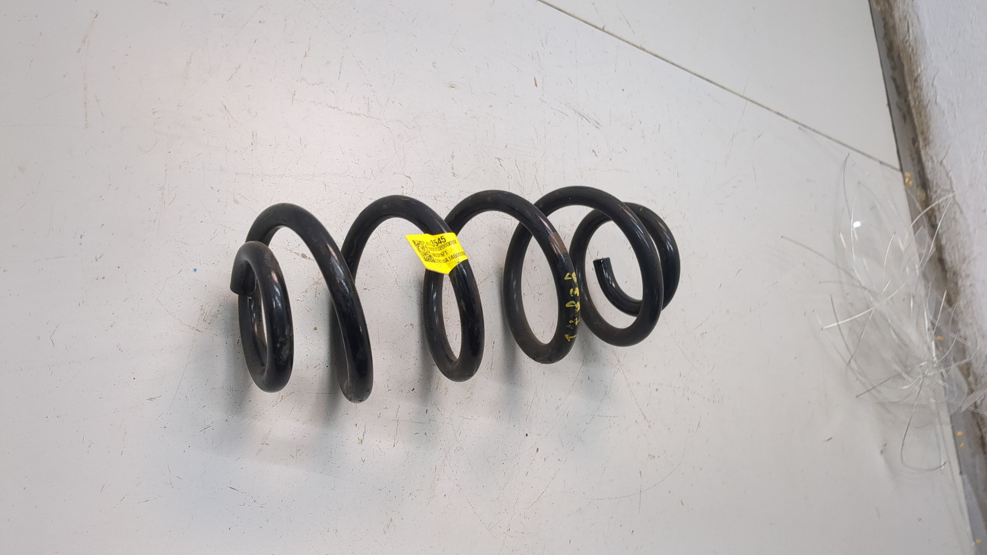 Пружина задняя