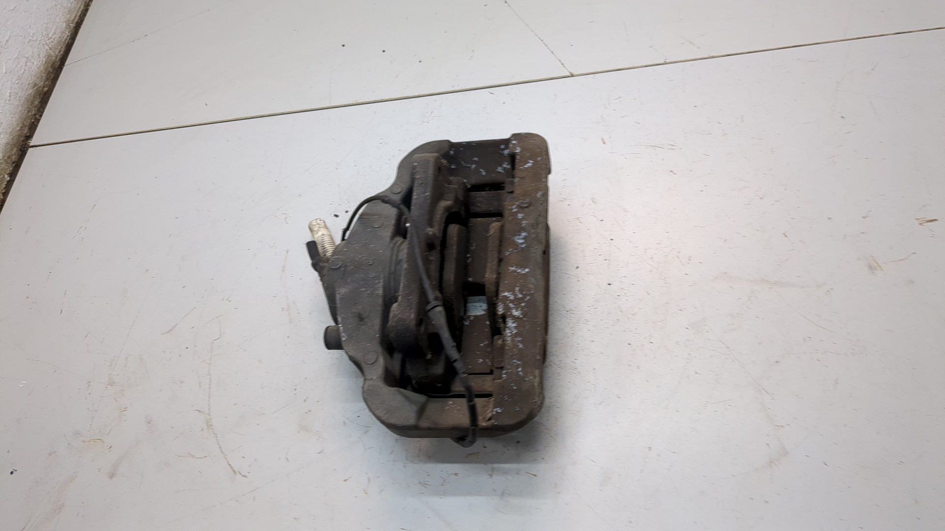 Суппорт передний левый