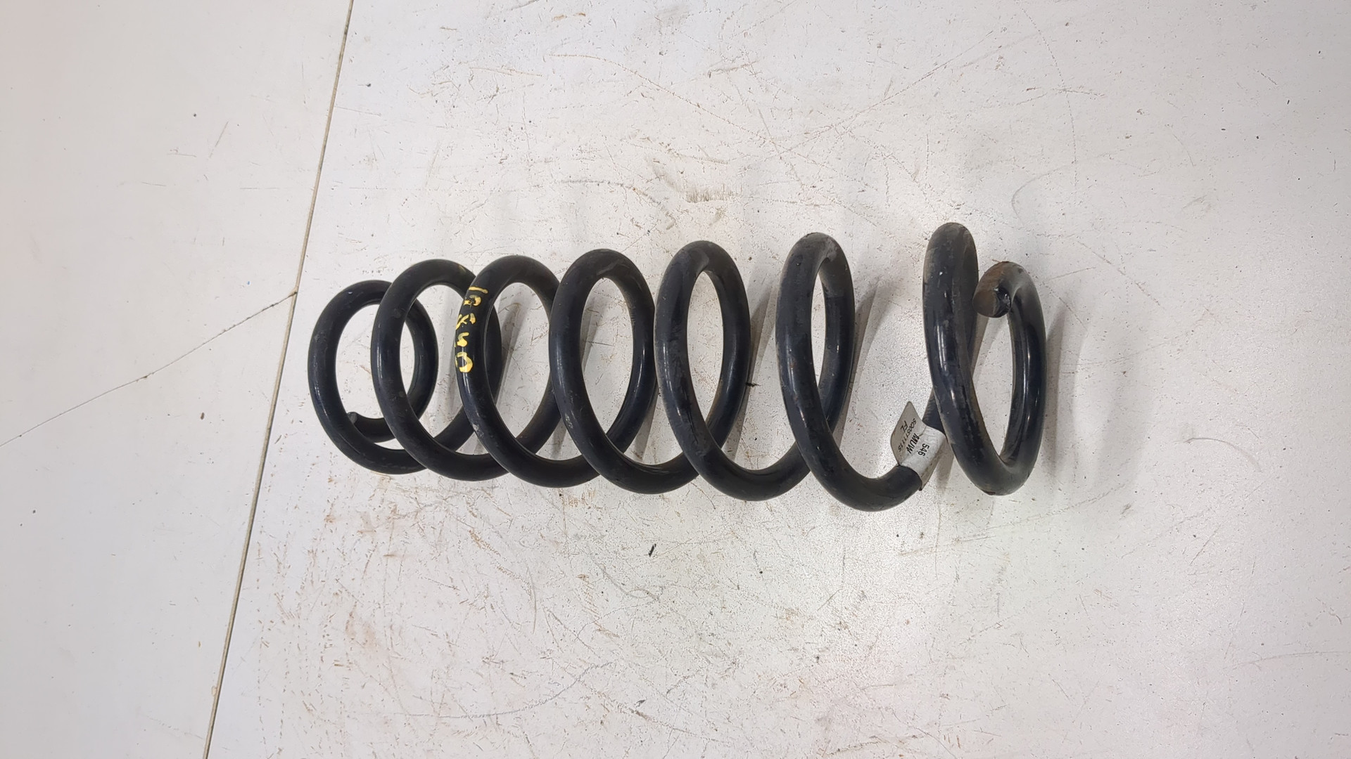 Пружина задняя