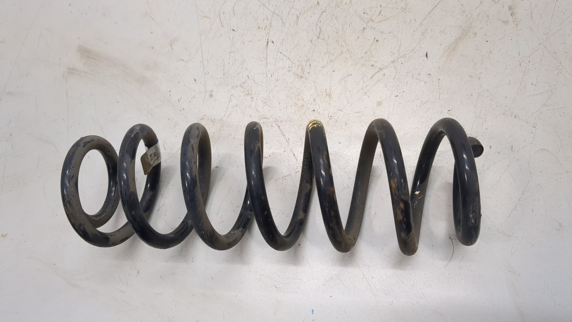 Пружина задняя