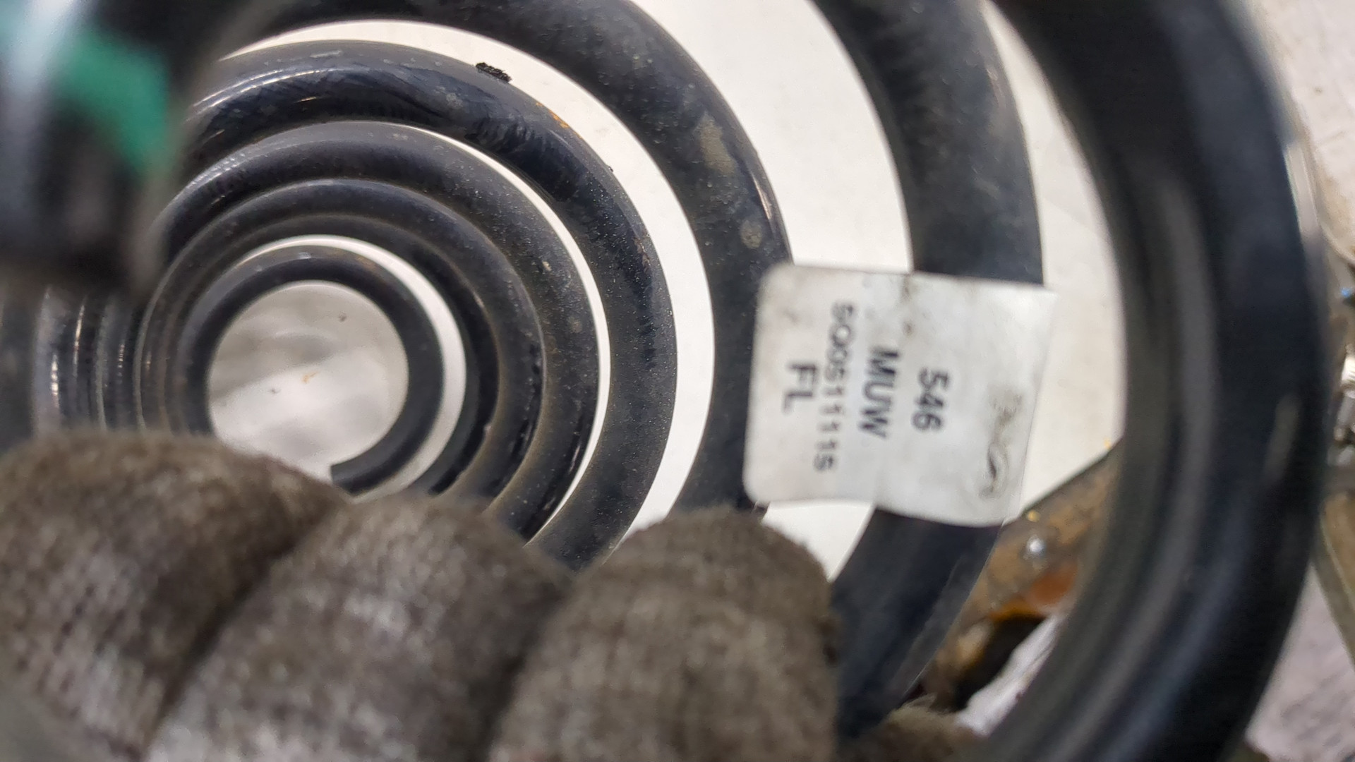 Пружина задняя