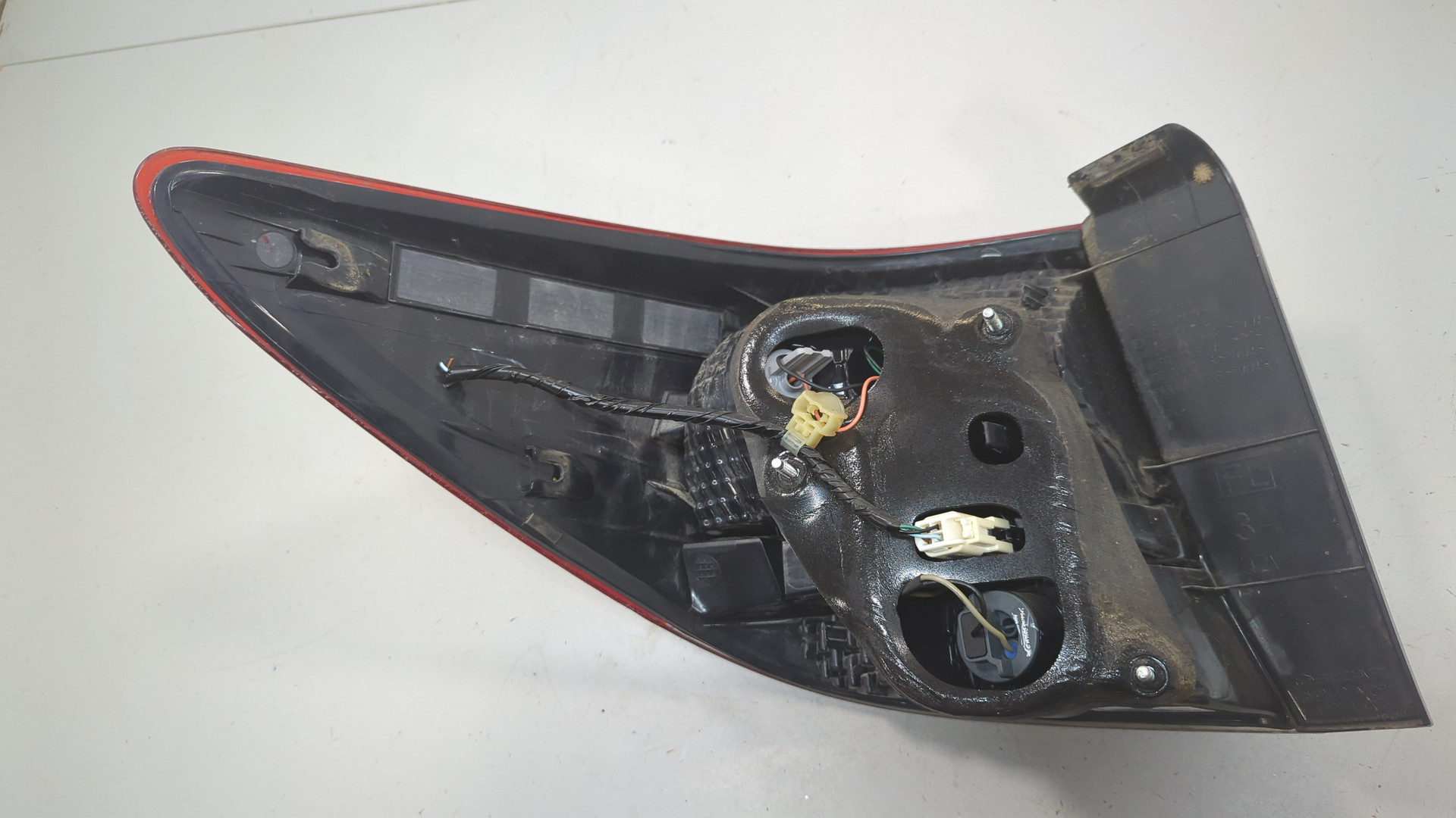 Фонарь задний левый