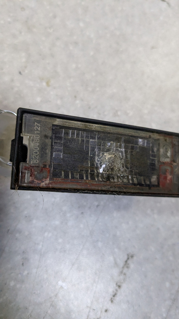 Фонарь подсветки номера