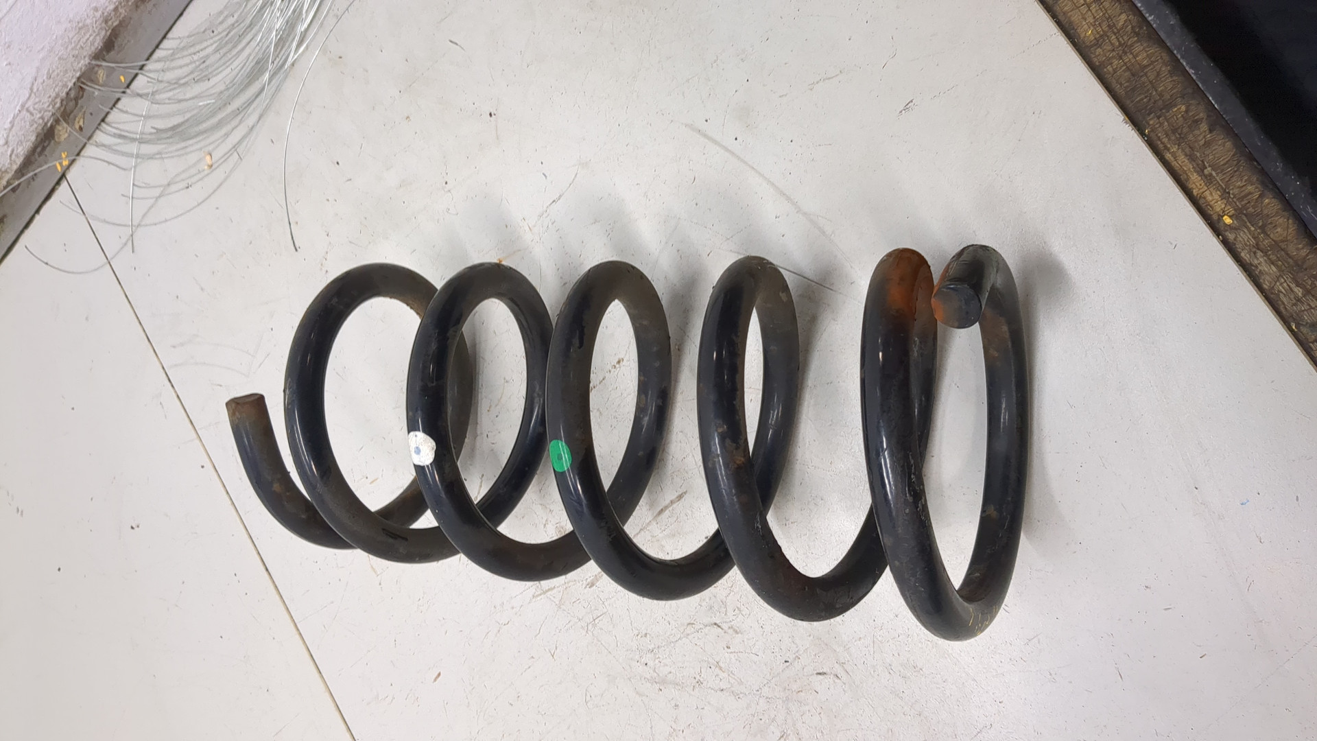 Пружина задняя