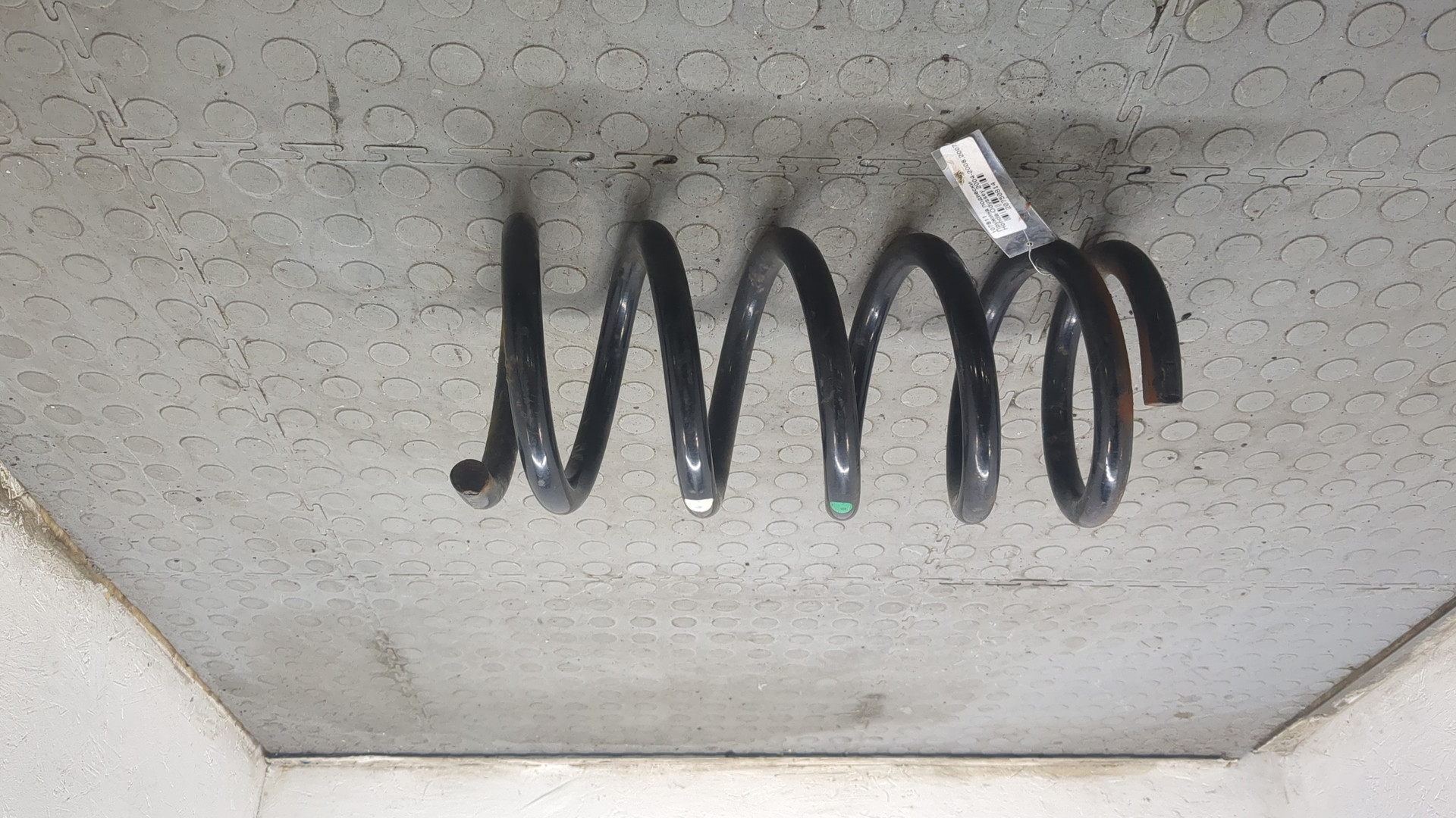 Пружина задняя