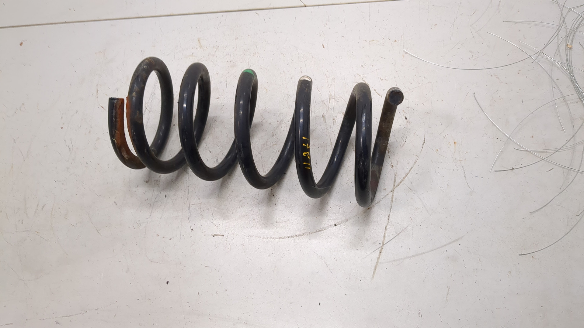 Пружина задняя