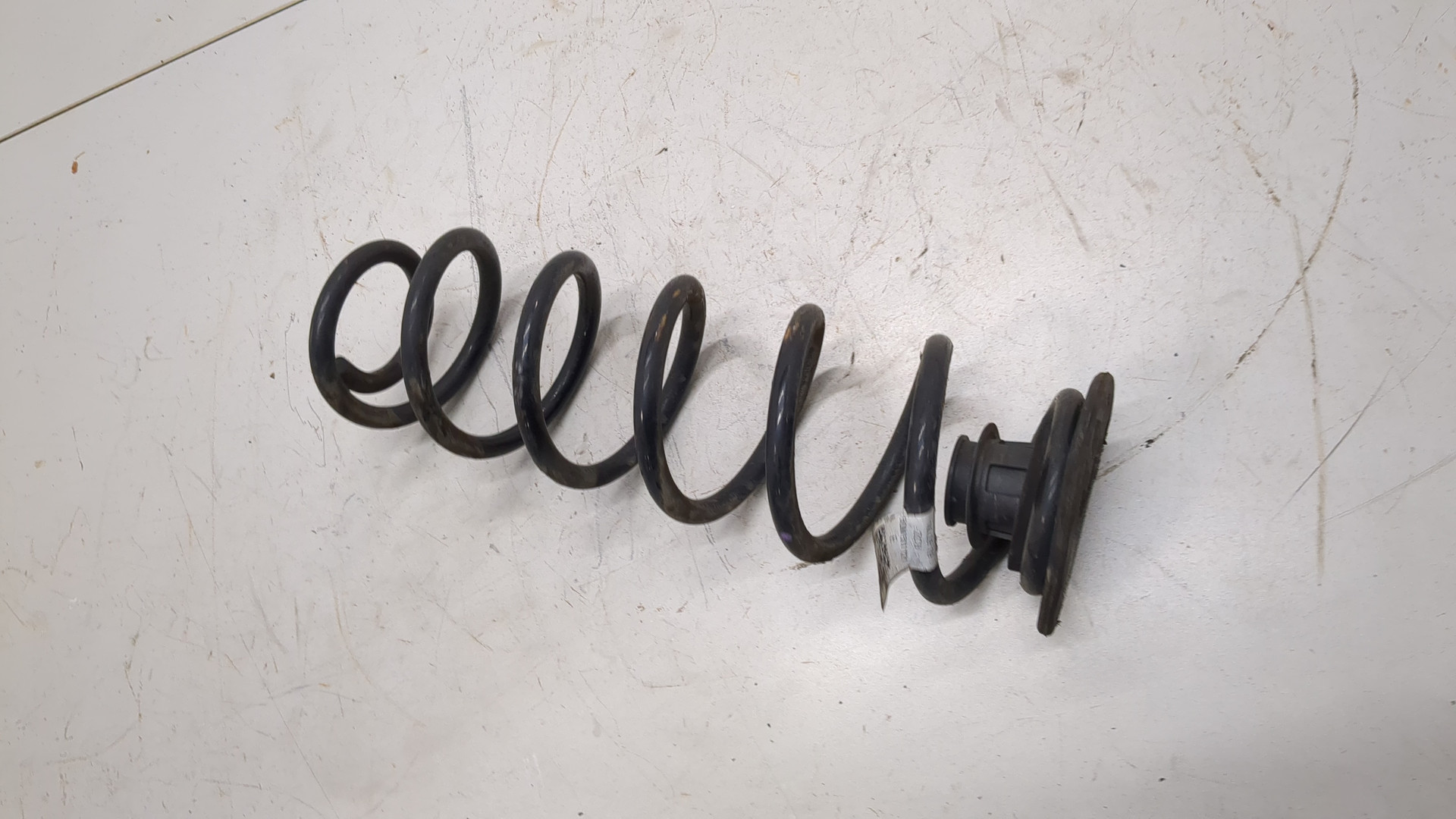 Пружина задняя