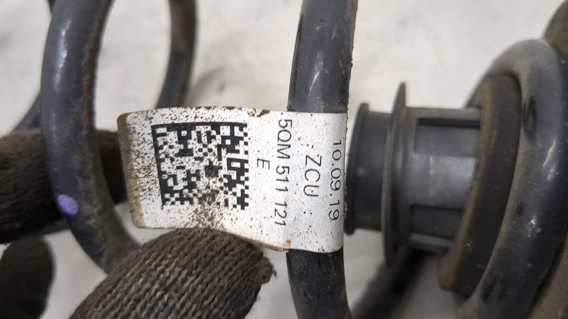 Пружина задняя