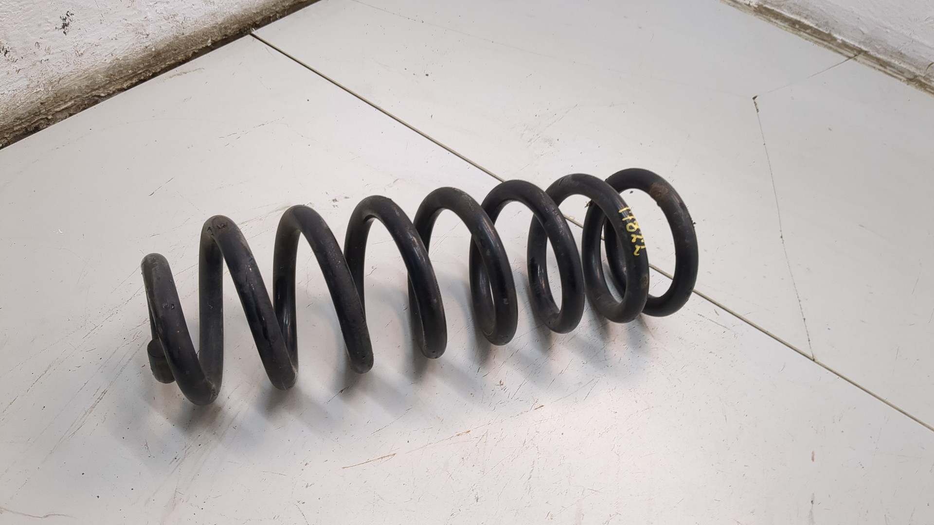 Пружина задняя