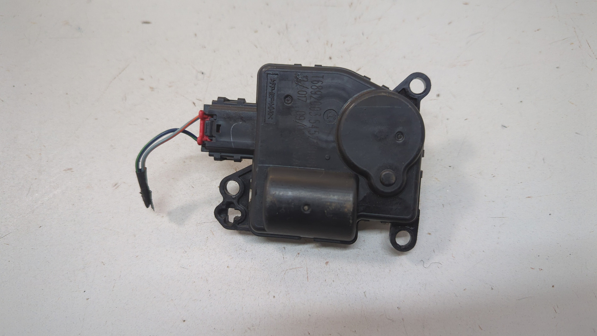 Моторчик заслонки печки