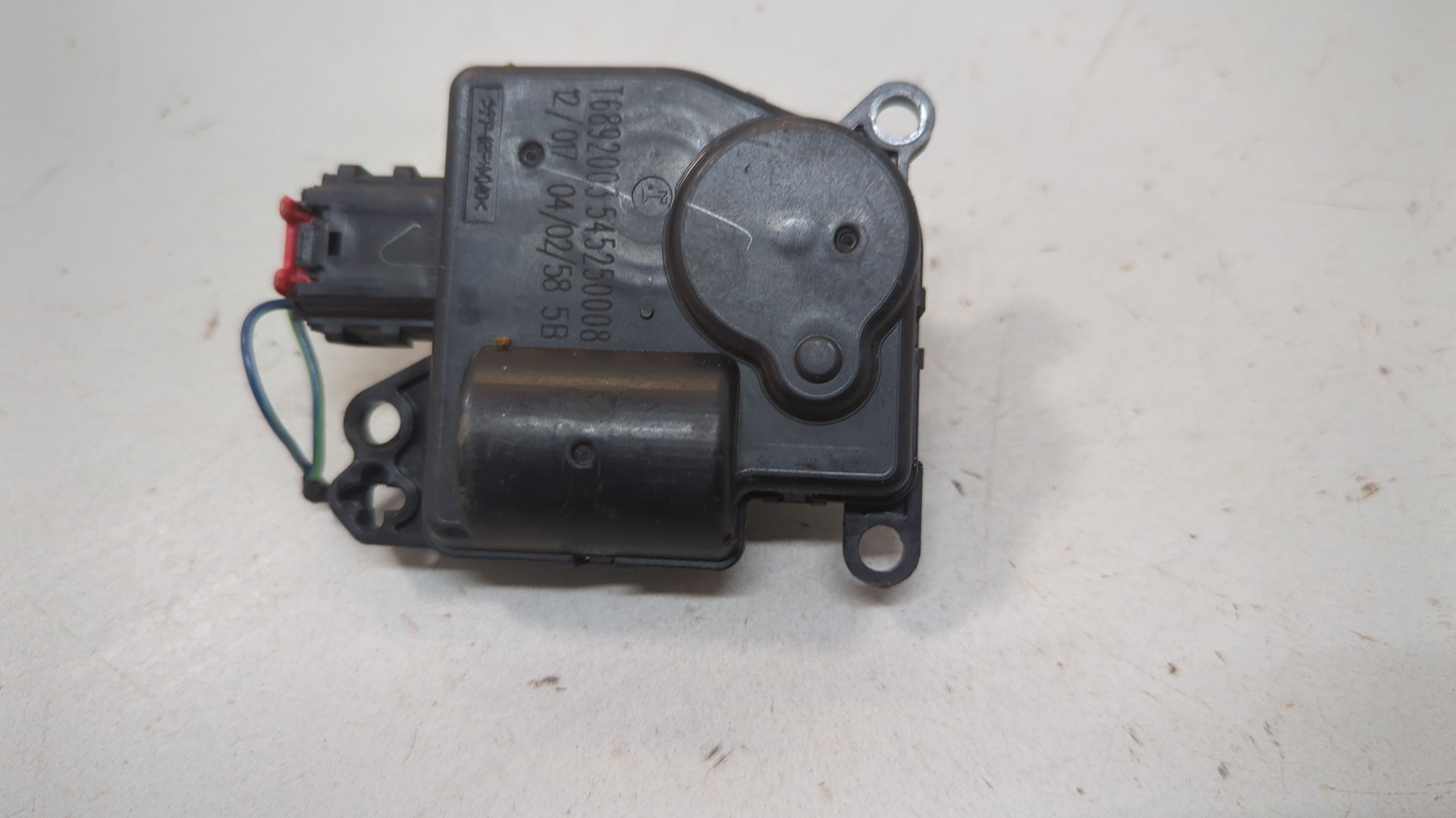 Моторчик заслонки печки