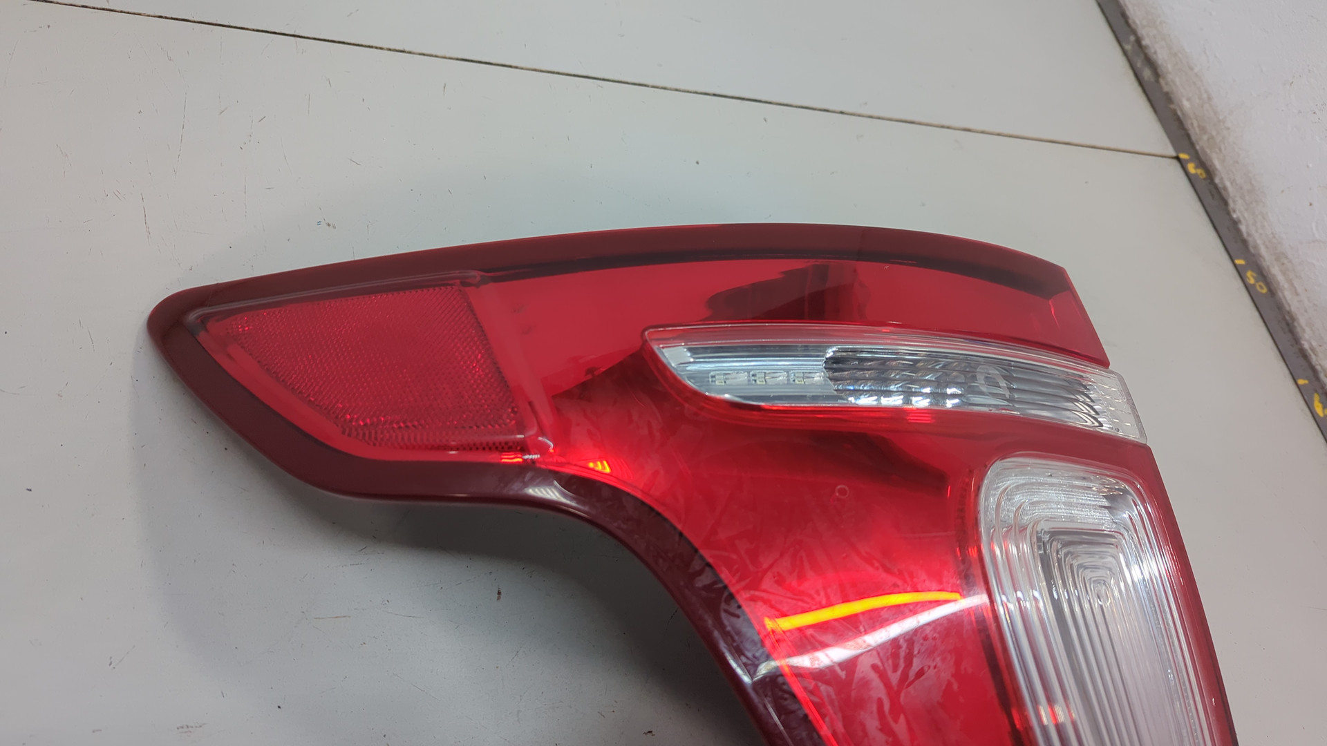 Фонарь задний левый