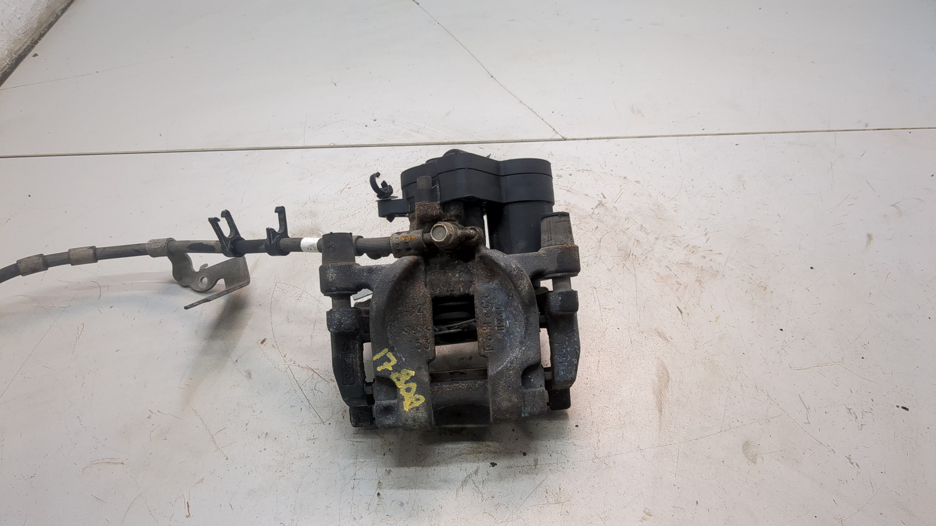 Суппорт задний левый