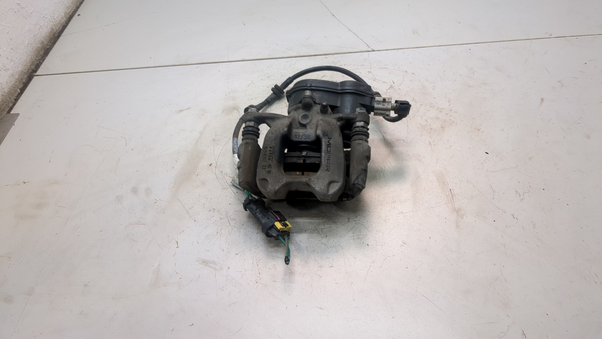 Суппорт задний левый