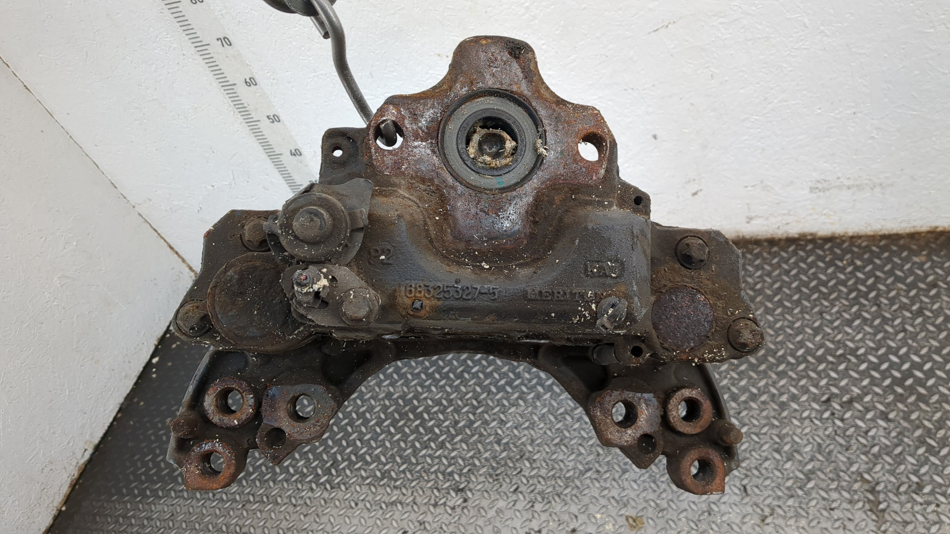 Суппорт задний левый