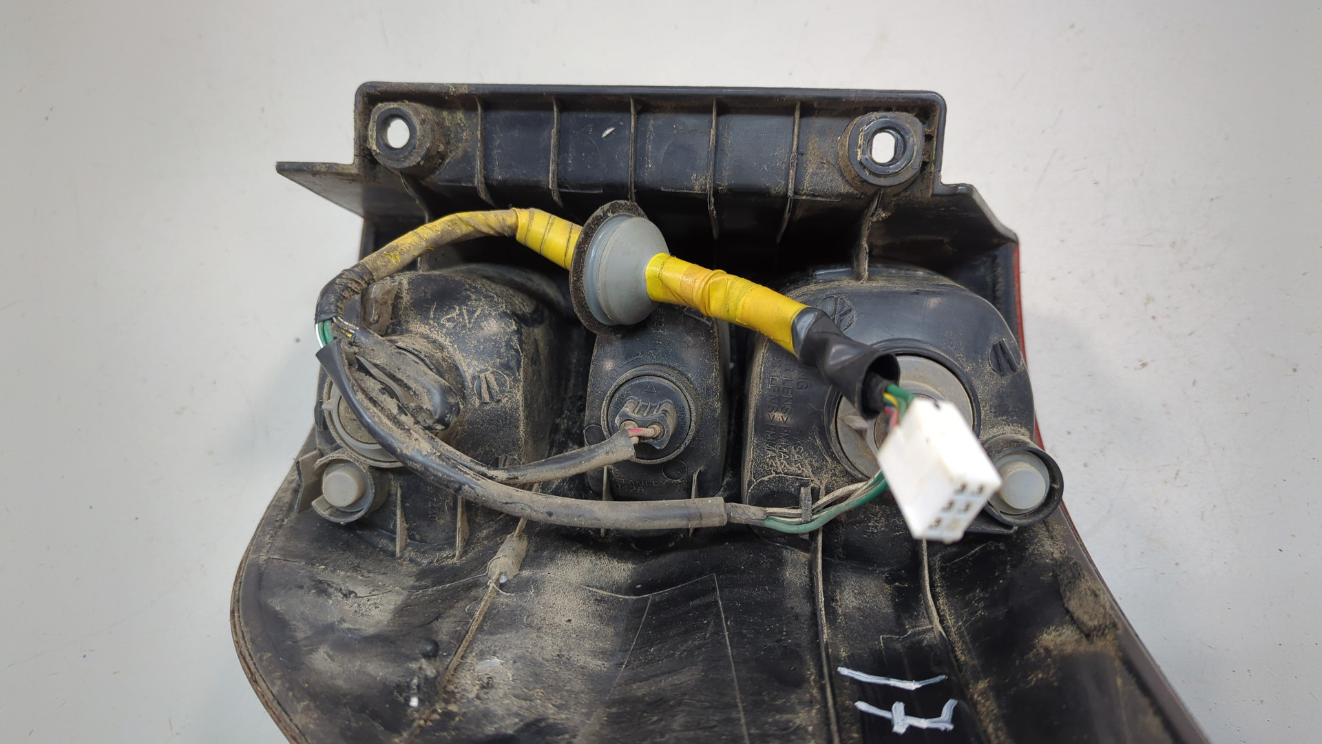 Фонарь задний левый