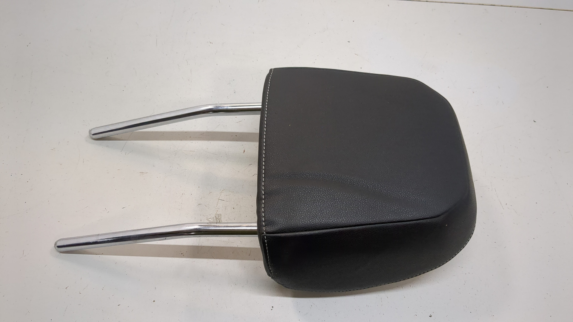 Подголовник сиденья