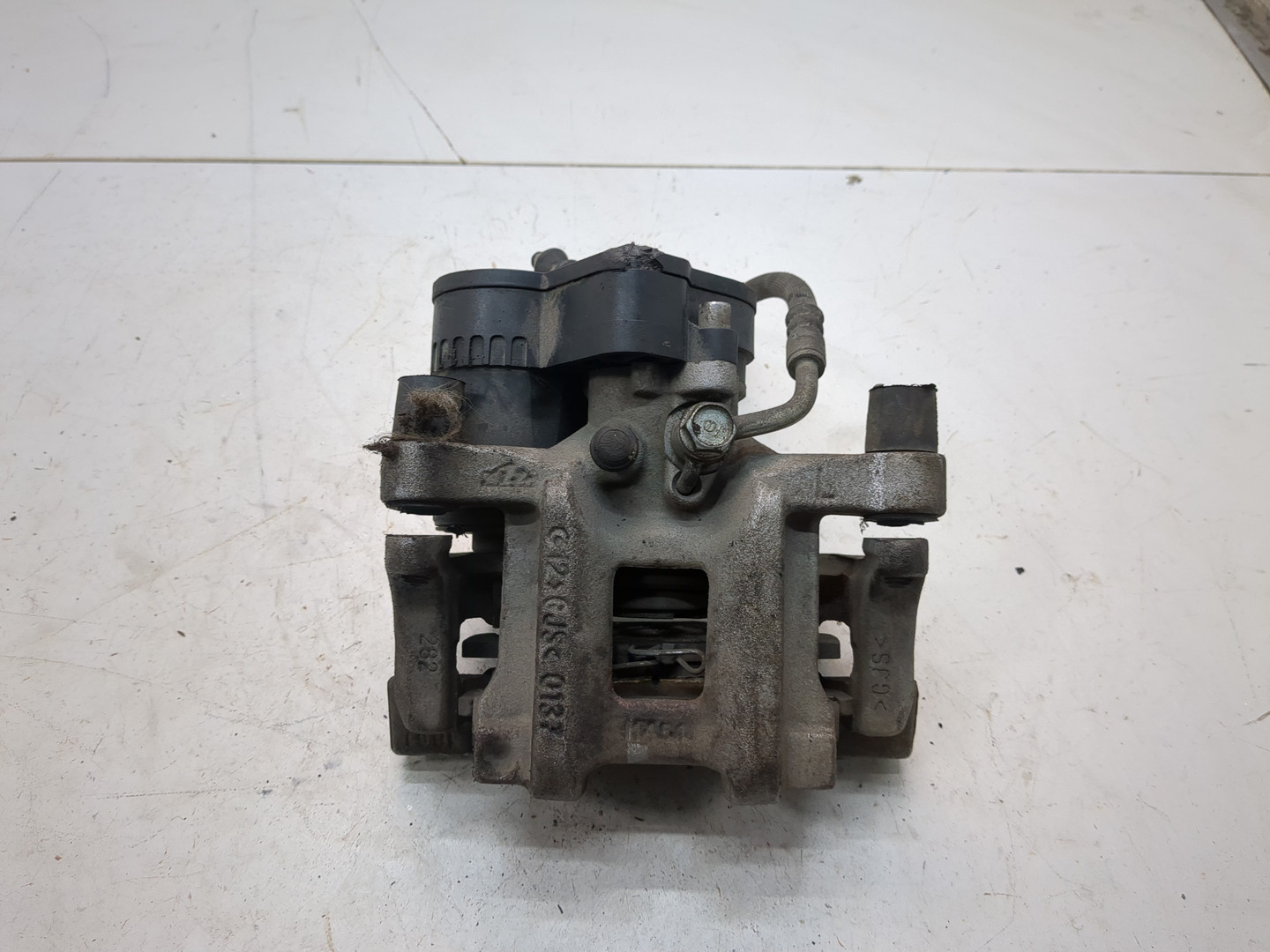 Суппорт задний левый