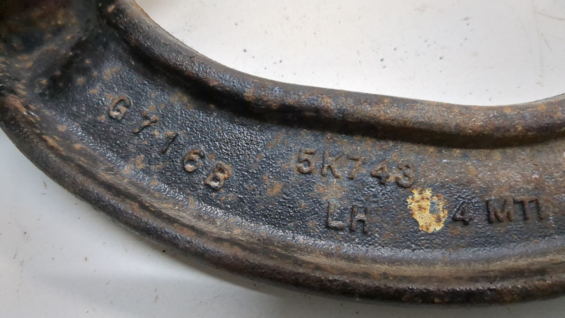 Рычаг задний левый