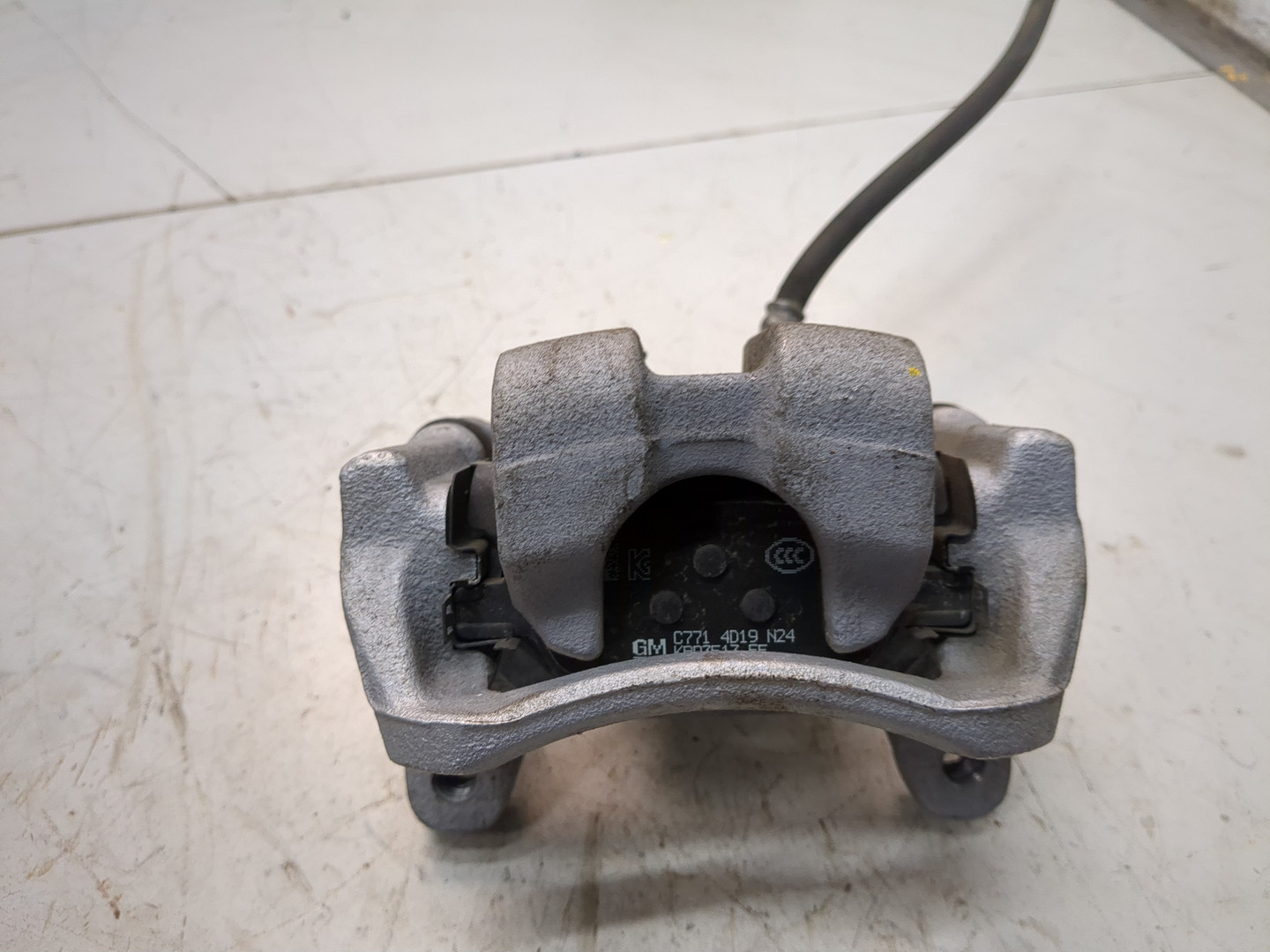 Суппорт задний левый