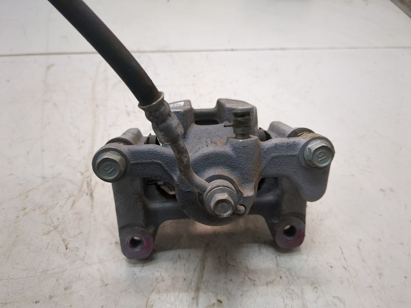 Суппорт задний левый