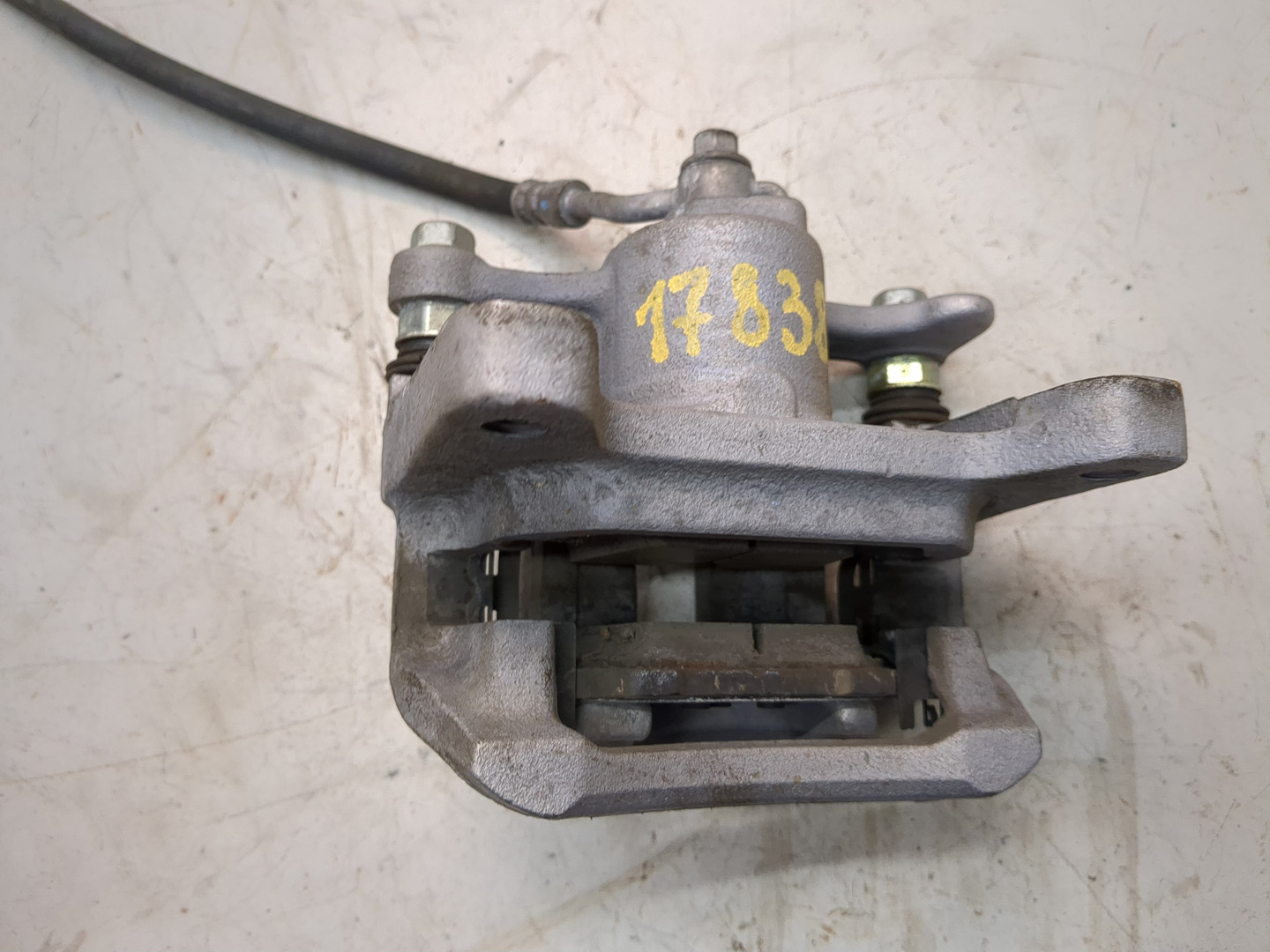 Суппорт задний левый