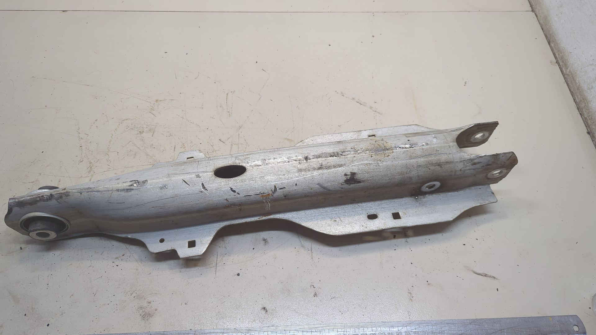 Рычаг задний