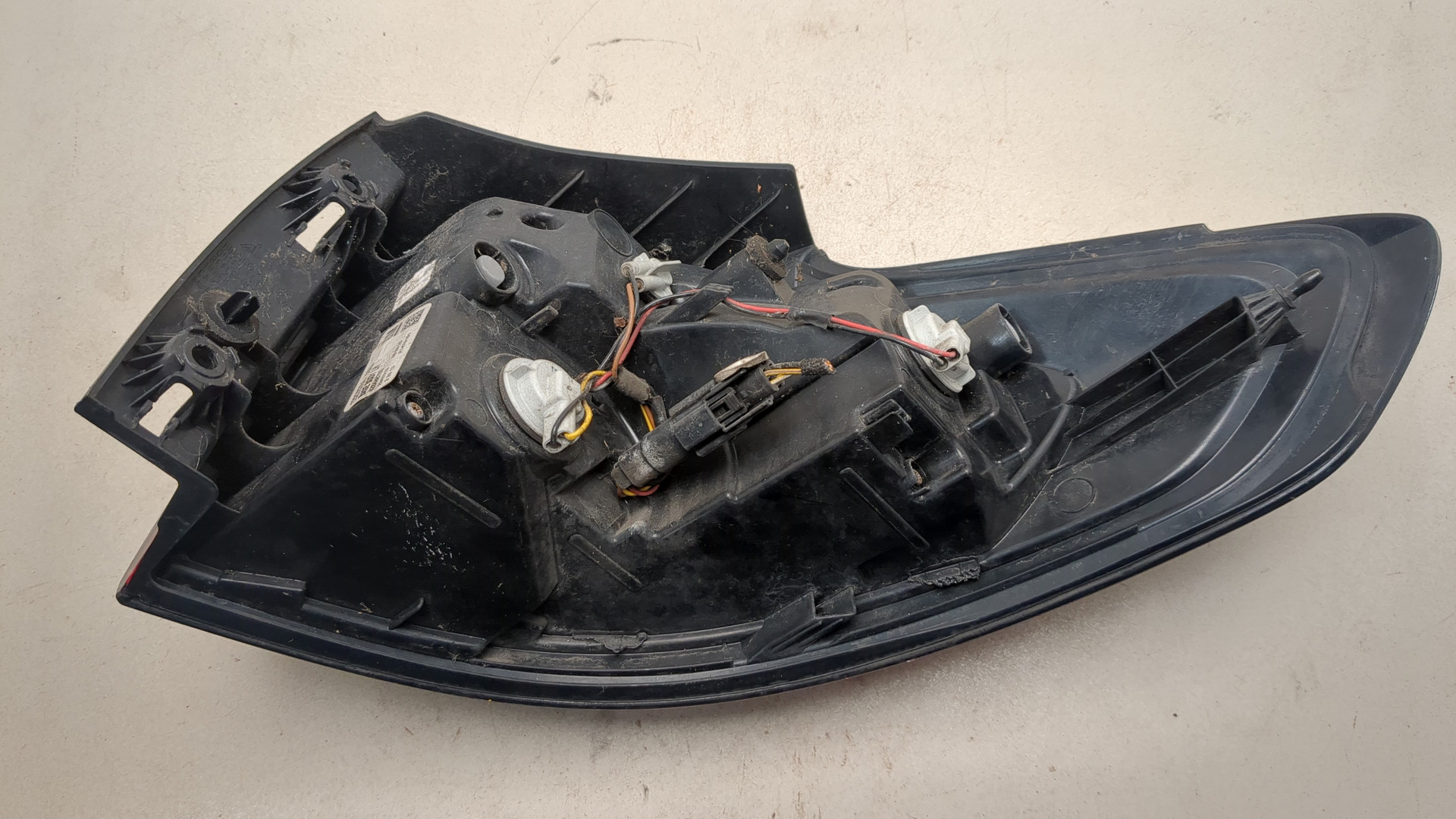 Фонарь задний левый