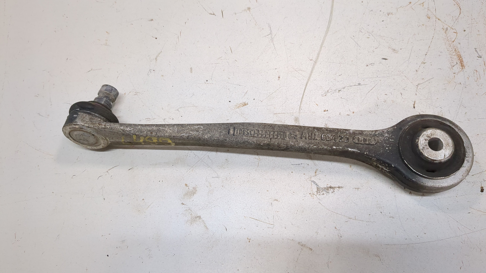 Рычаг передний левый