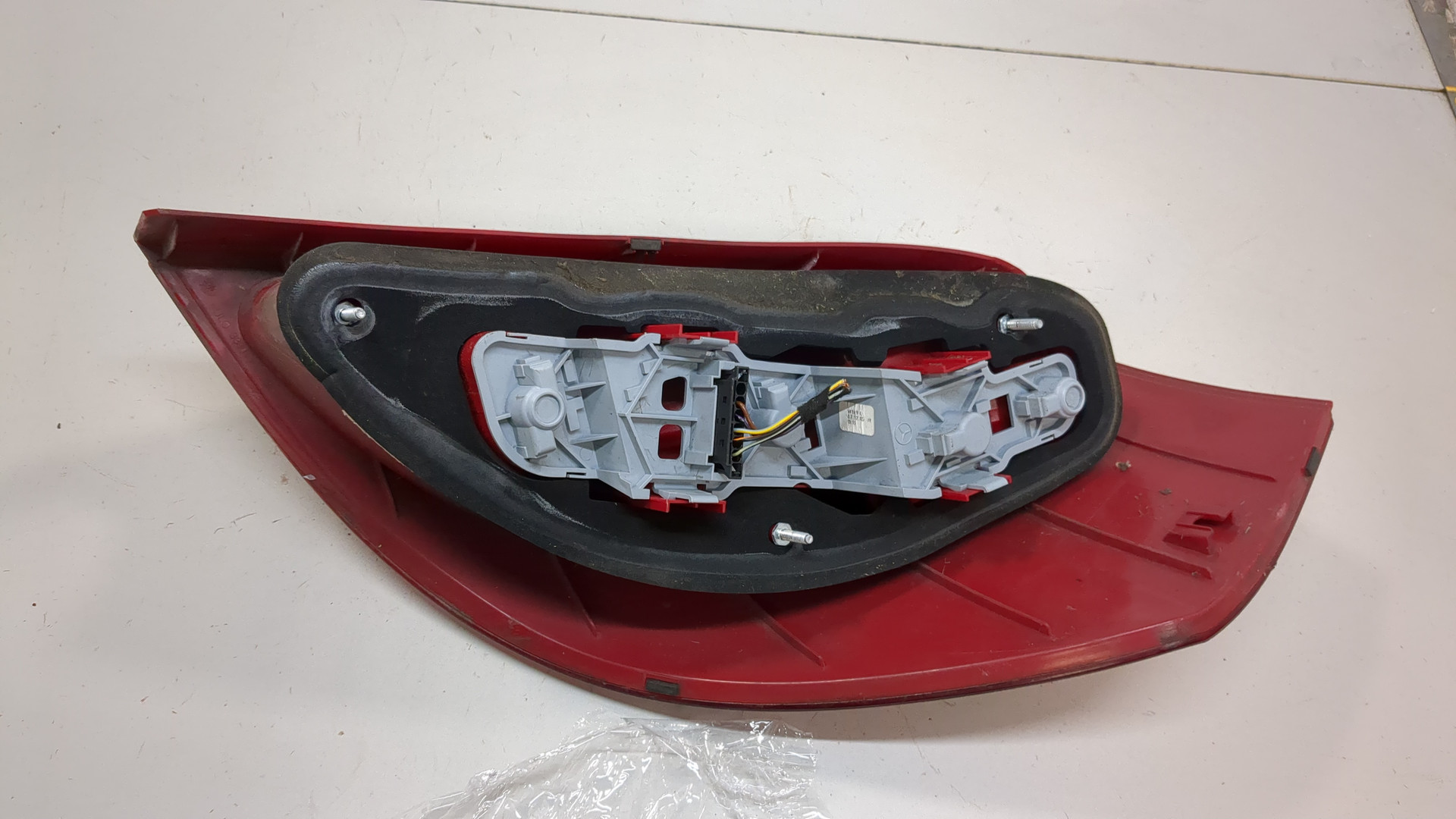 Фонарь задний левый