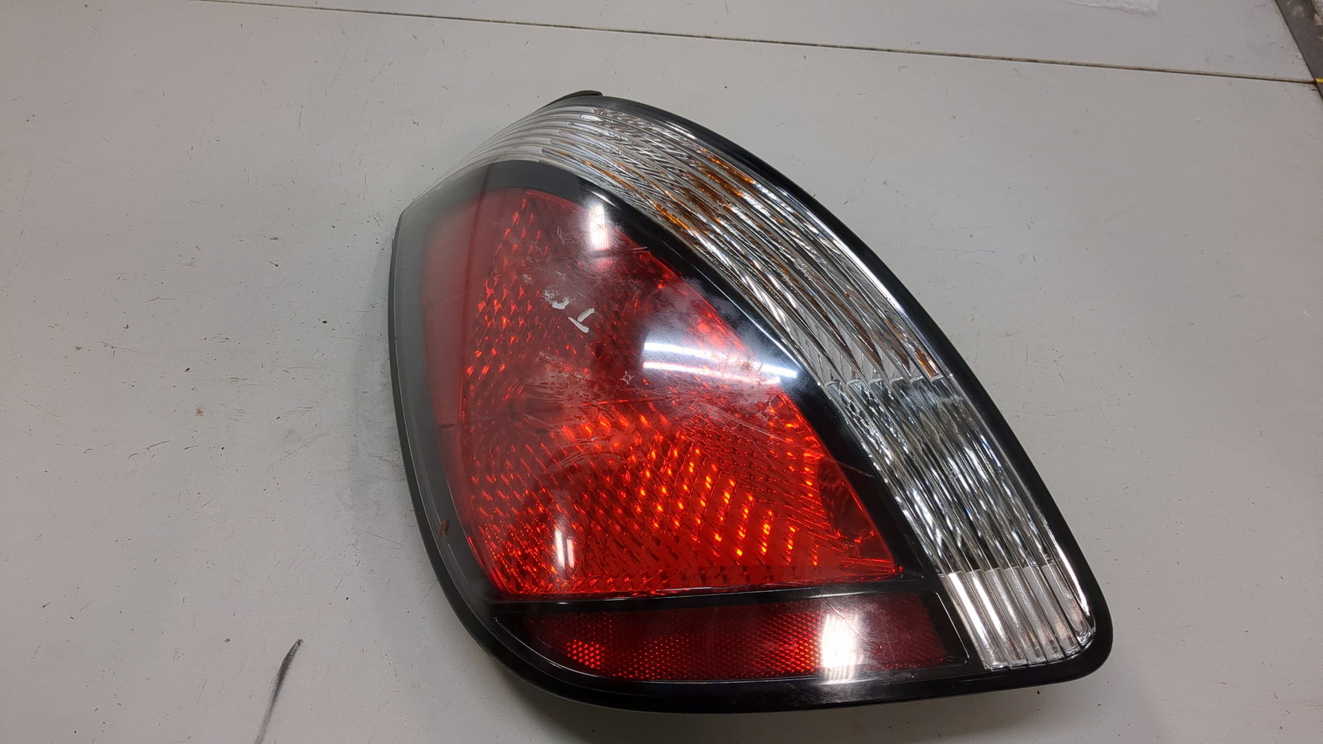 Фонарь задний левый