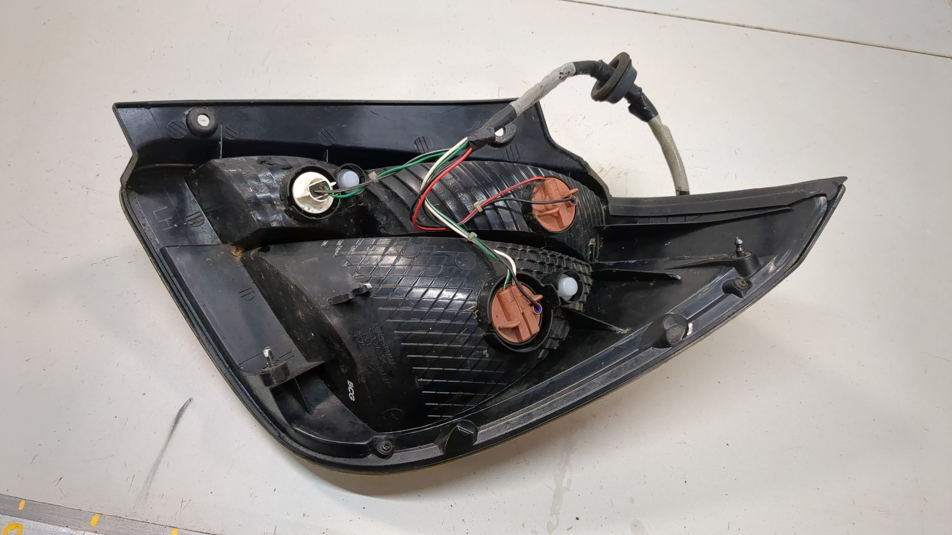 Фонарь задний левый