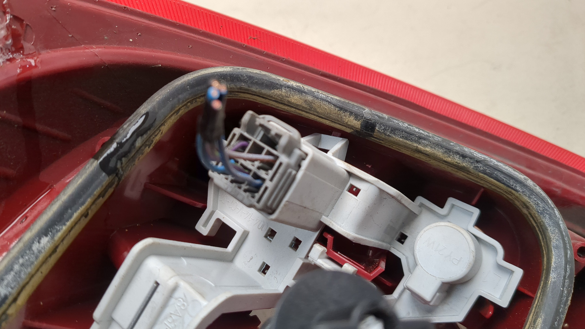 Фонарь задний левый