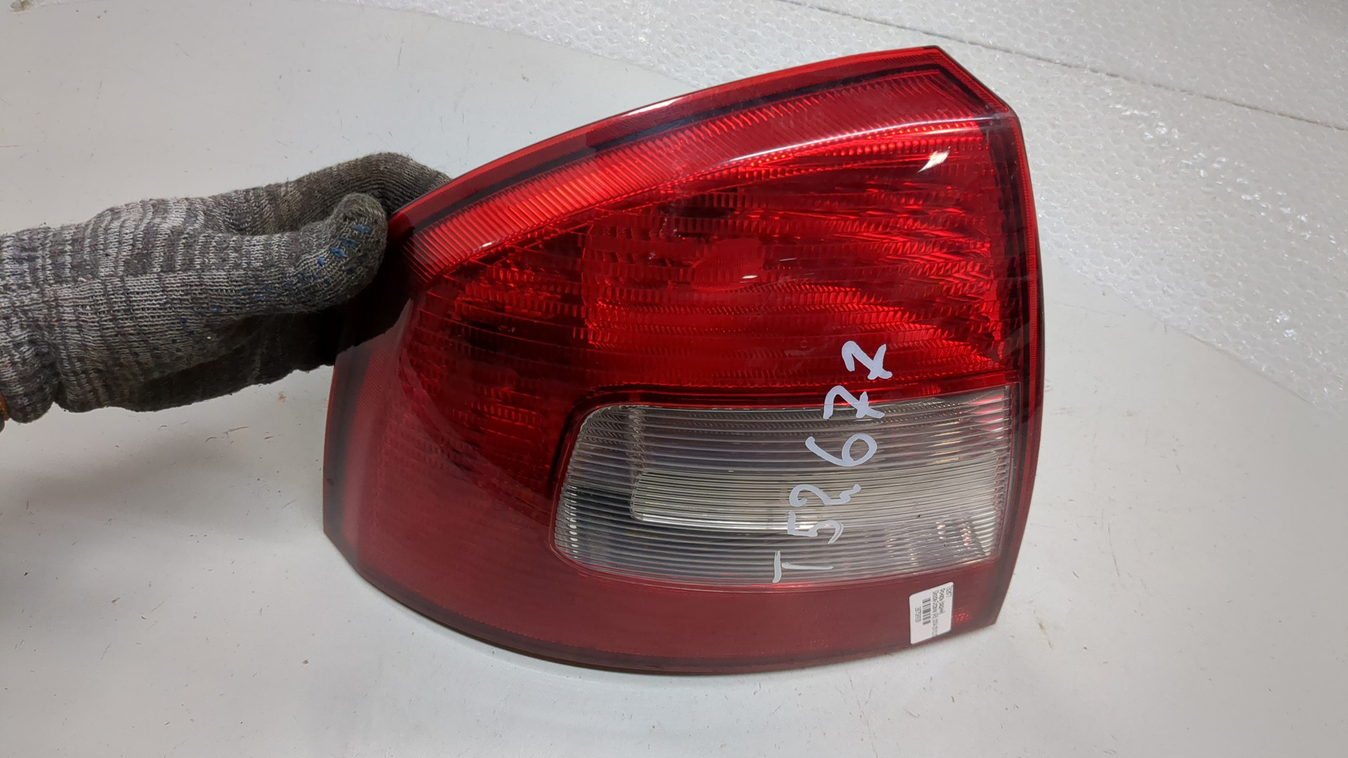 Фонарь задний левый