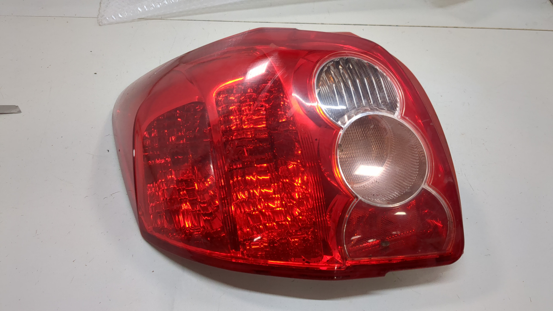 Фонарь задний левый