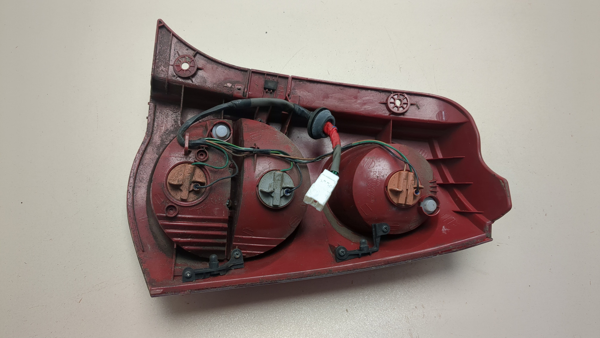 Фонарь задний левый