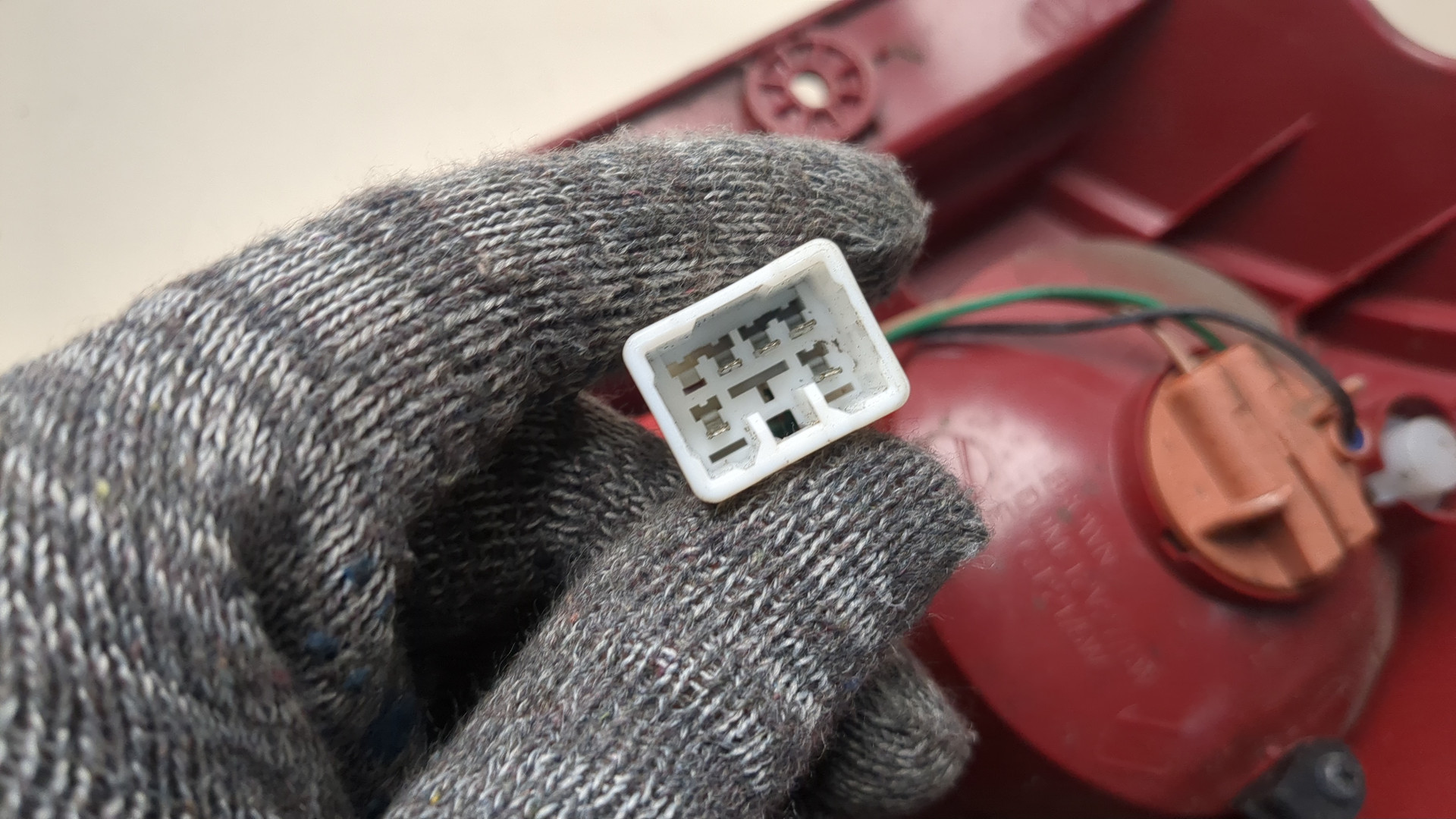 Фонарь задний левый