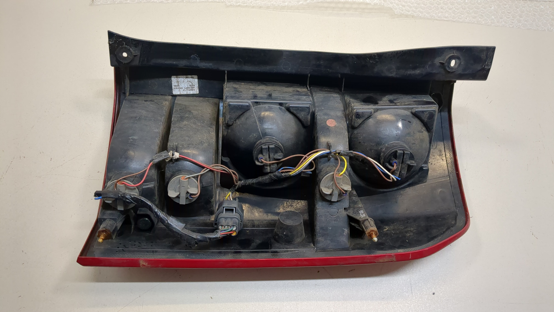 Фонарь задний левый