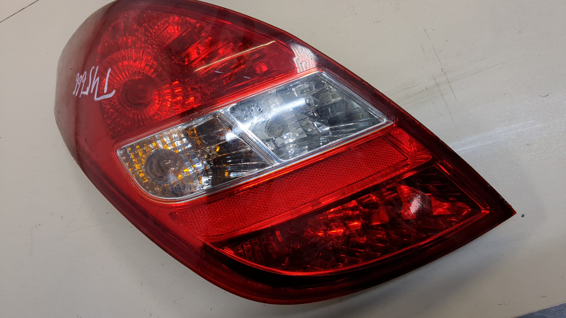 Фонарь задний левый