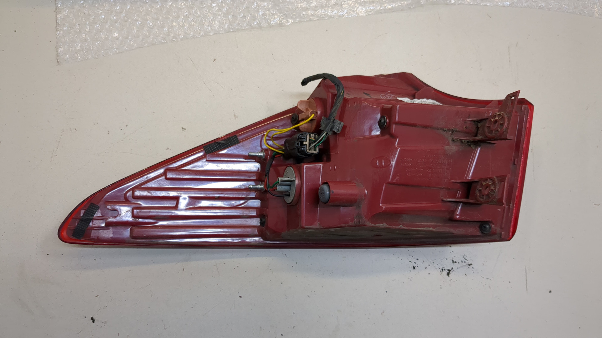 Фонарь задний левый