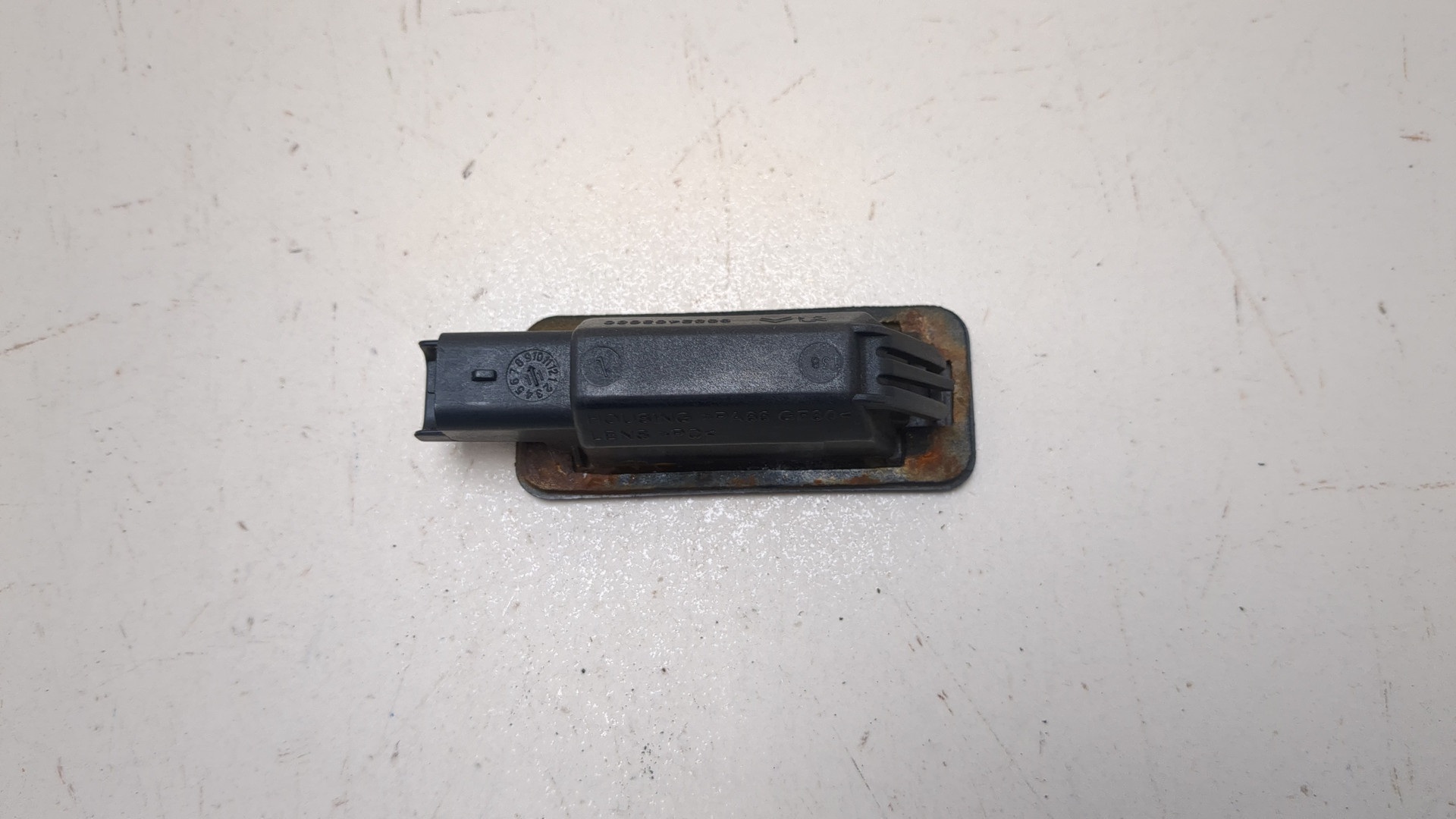 Фонарь подсветки номера