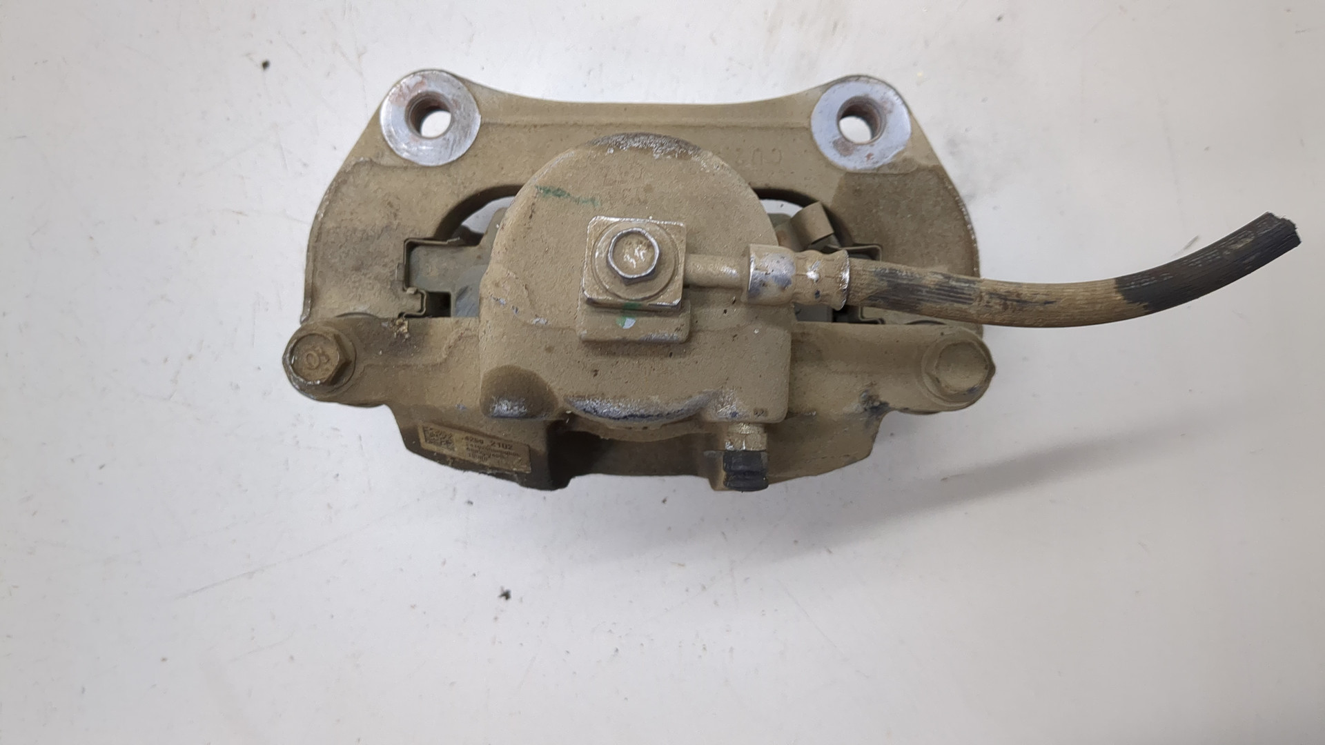 Суппорт передний левый