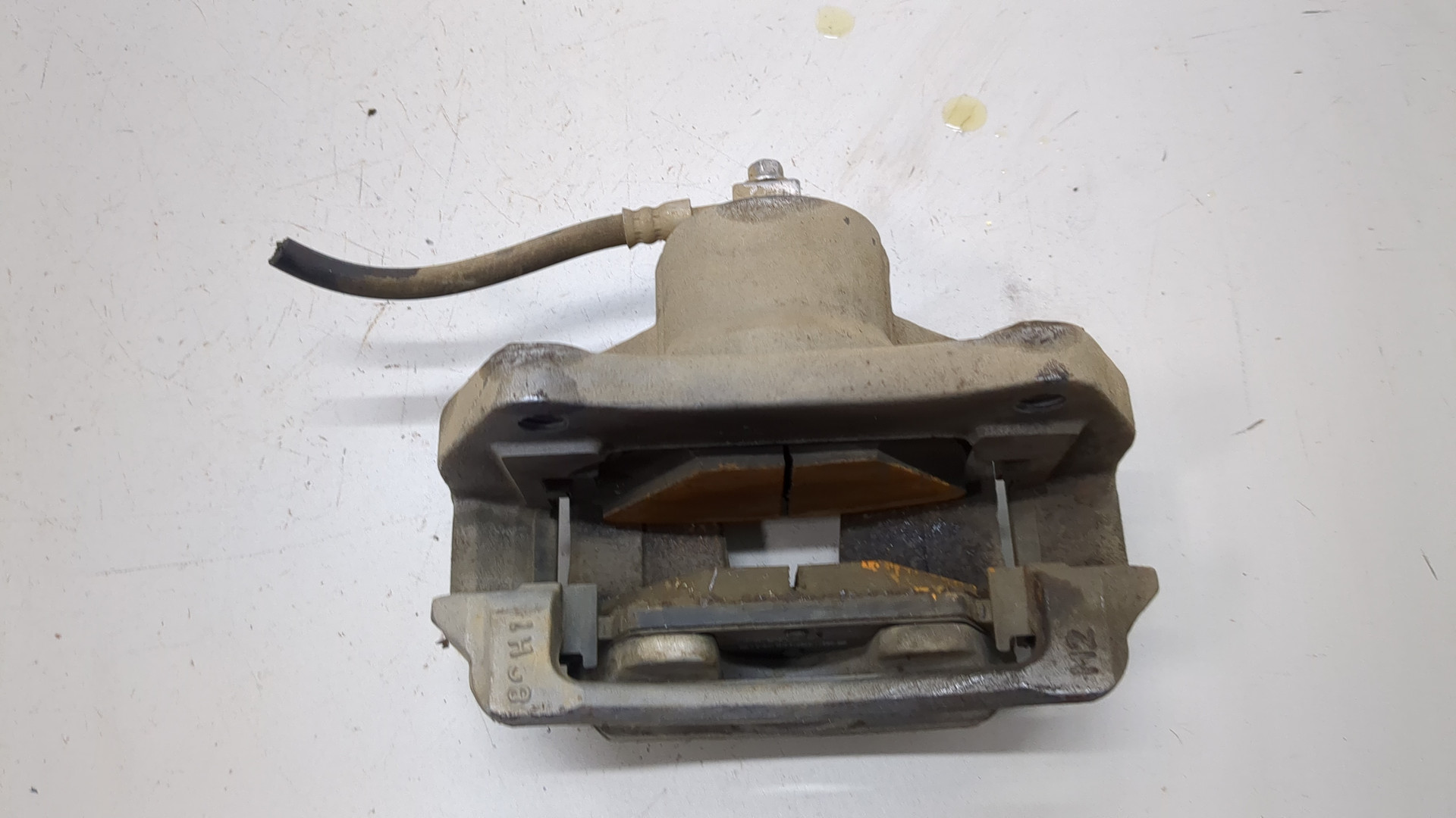 Суппорт передний левый